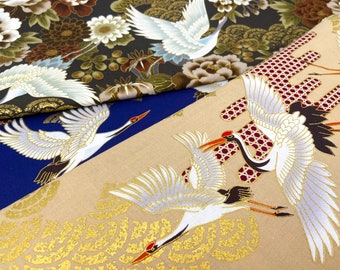 Tissu en coton avec des grues japonaises beige, rouge, bleue, marron, noire | Vendu au mètre avec des vagues dorées pour projets patchwork & DIY