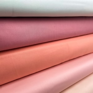 Organic cotton fabric by Birch (GOTS) | Solid Eco Poplin in cream, pale pink, apricot, antique pink & mint