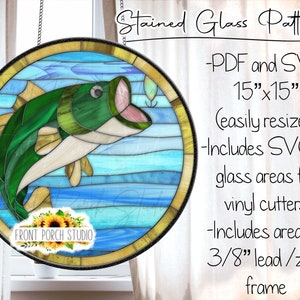 May include: A stained glass pattern of a bass jumping out of the water. The pattern is in a circle with a gold frame. The pattern is 15 inches by 15 inches and includes SVG files for vinyl cutters and a 3/8 inch lead/zinc frame.