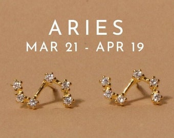 Brincos com o símbolo da constelação de Áries, banhados a ouro 14k e prata de lei.