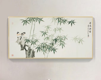May include: A framed painting depicting a bamboo forest with two birds perched on a branch. The painting is in a gold frame and has a white background. The bamboo is green and the birds are brown and white.