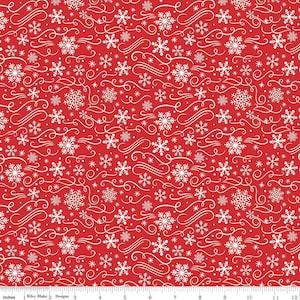 Riley Blake 100% Premium Cotton Fabric. The Magic of Christmas. Snowflakes Red. Sold by the 1/2 yard