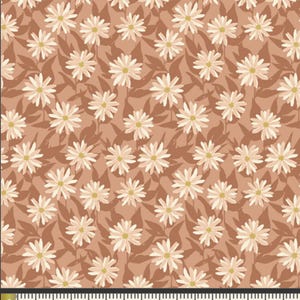 May include: A fabric with a repeating floral pattern. The design features cream-colored daisies with yellow centers and brown leaves on a terracotta background. The pattern is measured in inches.