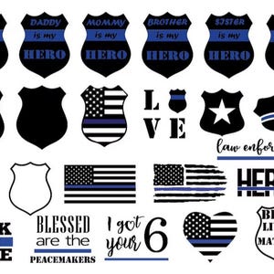 May include: A collection of black and blue law enforcement themed graphics. Designs include shield shapes with text like "Daddy is my HERO", American flags, and the words "HEROES" and "BLUE LIVES MATTER".