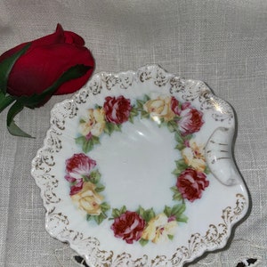 Sweet little vintage floral trinket dish. Perfect for shabby chic decor.