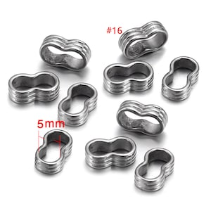 May include: A group of 10 silver-toned metal spacer beads, each with a double loop design. The beads are 5mm in diameter and are labeled #16.