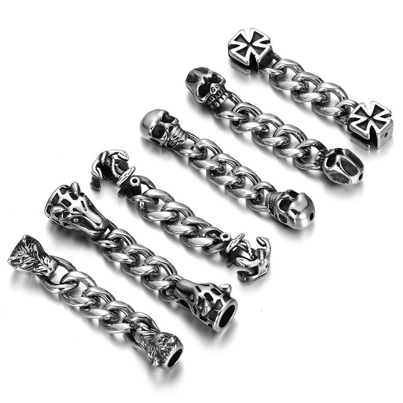 May include: A set of eight silver-toned metal bracelet charms featuring various designs, including skulls, anchors, and a cross. The charms are connected to a silver-toned chain.