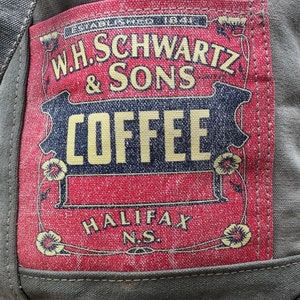 May include: Vintage red and white coffee bag label with the text "W.H. Schwartz & Sons Coffee Halifax N.S."
