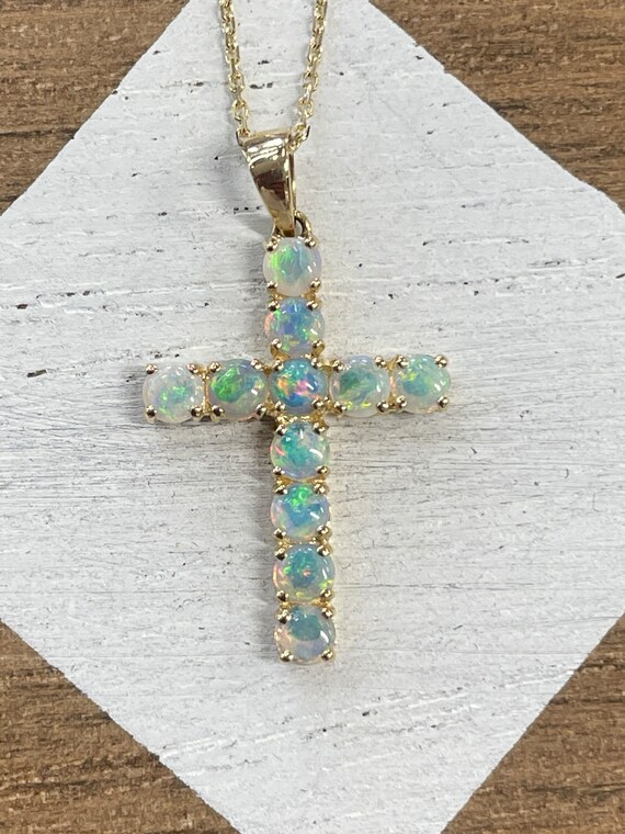 Unbelievable opal cross Gem