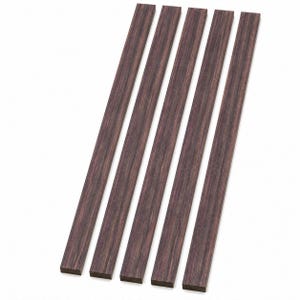 May include: Five rectangular wooden strips with a dark brown color and visible wood grain. The strips are arranged diagonally against a white background, showcasing their natural texture and color variations. These appear to be for woodworking or craft projects.
