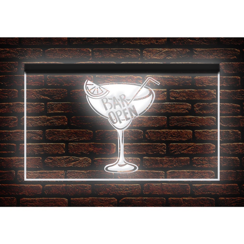 May include: A neon sign featuring a cocktail glass design with the words "BAR OPEN" in white. The sign is set against a dark brick wall and framed with a white border. A lemon slice and a straw are included in the cocktail glass design.