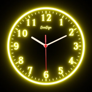 May include: A yellow neon clock with black numbers and hands. The clock face reads "EaseSign" and the numbers 1 through 12.