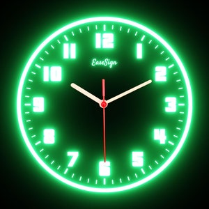 May include: A round, neon green clock with white numerals and hands against a black background. The clock face has the text "EaseSign" in a cursive font. The second hand is red.