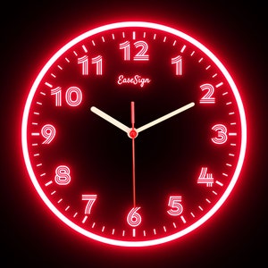 May include: A round, red neon clock with white numerals and hands. The clock face displays the numbers 1 through 12, with the brand name "EaseSign" in the center. The clock is set against a black background.