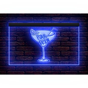 May include: A blue neon sign featuring a cocktail glass design with the words "BAR OPEN". The sign has a blue outline and is set against a brick wall background. The glass includes a lemon slice and a straw.