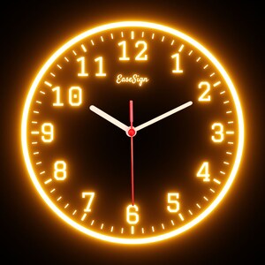 May include: A round, illuminated clock with a black face and a bright orange glowing border. White numerals mark the hours, with white hands and a red second hand. The text "EaseSign" is in the center.