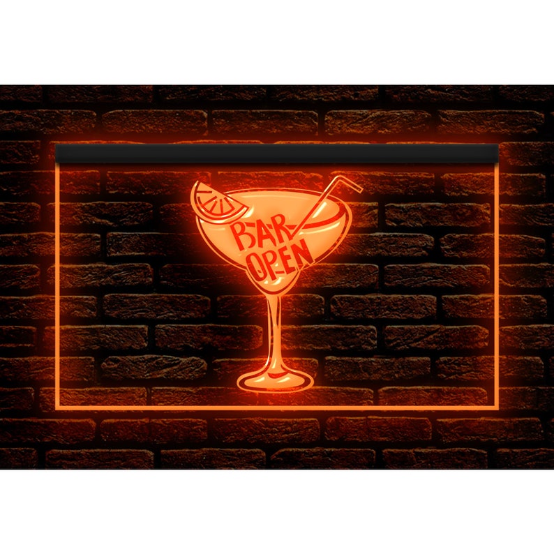 May include: An orange illuminated sign featuring a cocktail glass design with the words "BAR OPEN". The sign has a black border and is set against a dark brick wall. The cocktail glass includes a citrus slice and a straw.