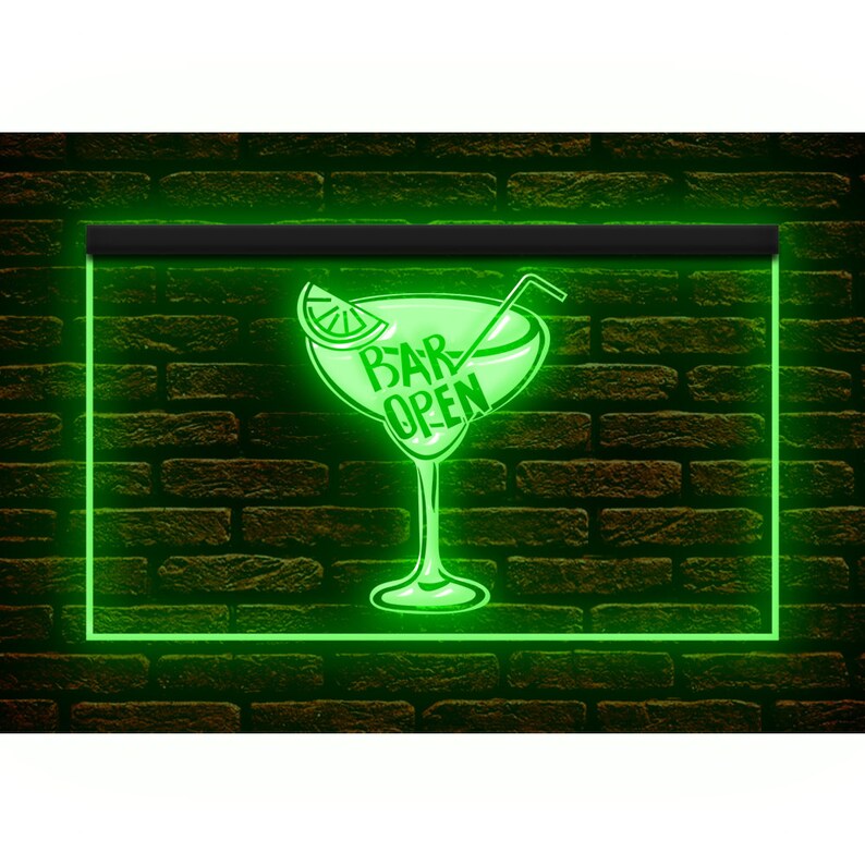 May include: A neon green sign featuring a margarita glass design with the text "BAR OPEN". The sign is framed in green and set against a brick wall. The margarita glass includes a lime wedge and a straw.