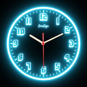 May include: A round, illuminated wall clock with a black face and a bright blue neon-style border. The clock features white numerals and hands, with a red second hand. The brand name "EaseSign" is displayed in white. The clock is set to approximately 1:10.