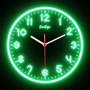 May include: A round, neon green clock with white numerals and hands against a black background. The clock face has the text "EaseSign" in a cursive font. The hands point to approximately 2:30.