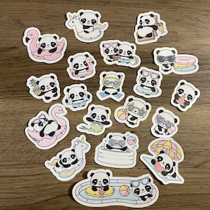 May include: A set of 18 panda stickers featuring various summer themes, including swimming, sunbathing, and floating on inflatables. The stickers are printed on white paper with black outlines and colorful accents.
