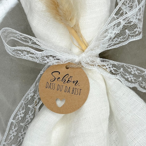 Round gift tag - Nice that you're here - made of kraft paper with a heart