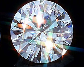 May include: A large, clear, round diamond with many facets reflecting light.