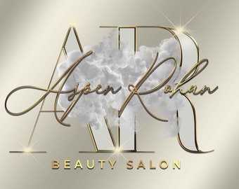 May include: A gold and white logo with the text "Aspen Rohan Beauty Salon" in a stylized script font. The letters "A" and "R" are outlined in gold and filled with white, with a white cloud-like design in the center.