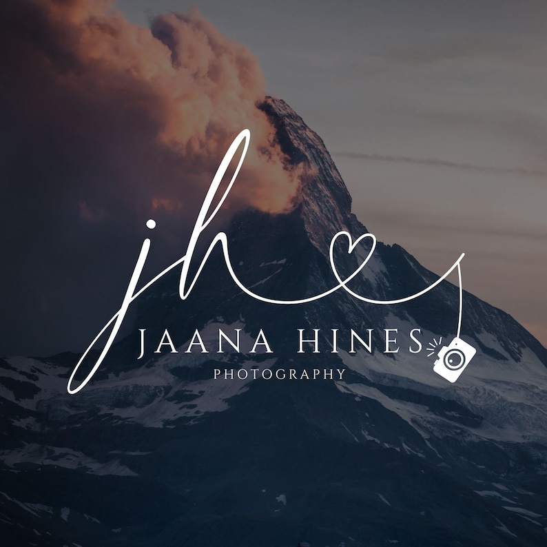 May include: A white cursive logo with the initials "jh" connected by a line that forms a heart shape. The text "Jaana Hines Photography" is below the logo.