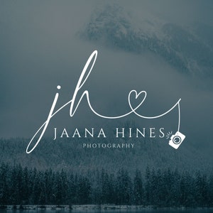 May include: A white cursive logo with the initials "jh" connected by a line that forms a heart shape. The text "Jaana Hines Photography" is below the logo.