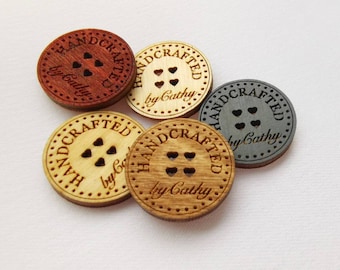 May include: Five wooden buttons with the text "HANDCRAFTED by Cathy" and three heart cutouts. The buttons are in various shades of brown and gray.