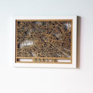 Mapa de Berlim cortado a laser em madeira para decorar paredes. emoldurado em preto ou branco