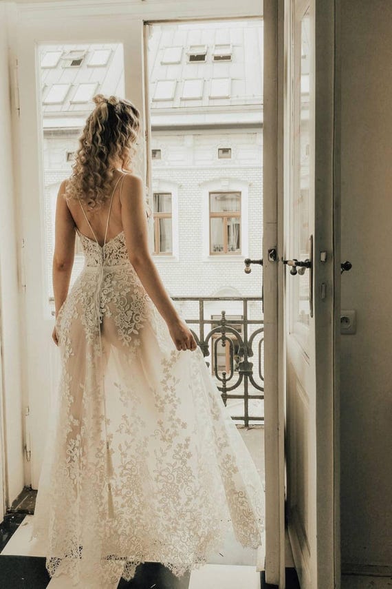Semi-Sheer Lace Bridal Gown, Unique Bold Floral Dress Design with Crossed Straps | Fiona