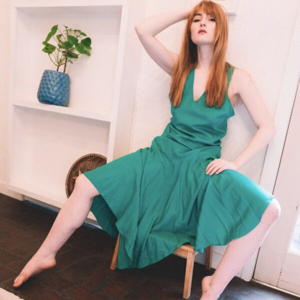 Emerald green halter dress by  Morgan Taylor