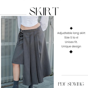 Puede incluir: Falda asimétrica gris con un diseño único. La falda larga es ajustable, disponible en tallas S a XL. La imagen también presenta el texto "ASIMETRIC SKIRT" y "PDF SEWING PATTERN".