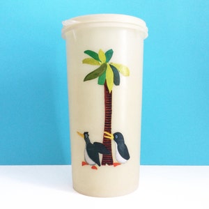 Vintage Tupperware Handolier canister with Tupper Seal lid, 1.5 quarts, penguins and palm tree, plastic beverage pitcher, Made in Britain