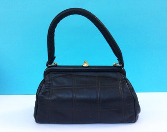 Vintage 60s handbag from Delco, black leather with top handle and gold tone snap clasp, gift for her