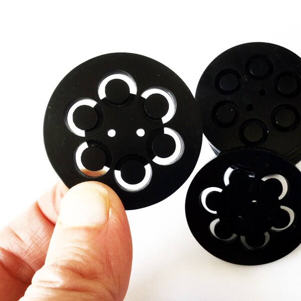 Large black buttons with flower detail, vintage buttons