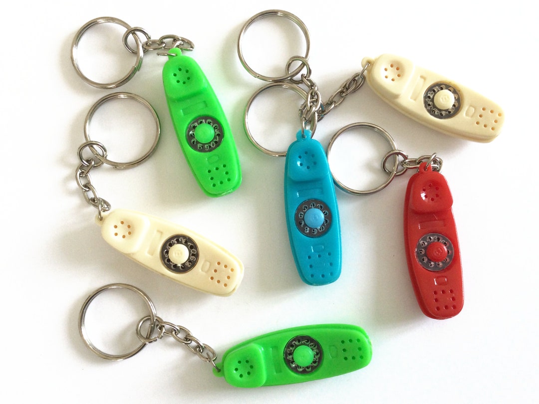 Vintage plastic figural clip-on hairbrush charms keyrings keychain —