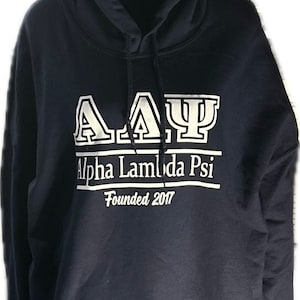 May include: A navy blue hooded sweatshirt with white lettering that reads "AAY Alpha Lambda Psi Founded 2017".