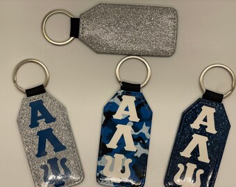 Alpha Lambda Psi keychain with glitter backing