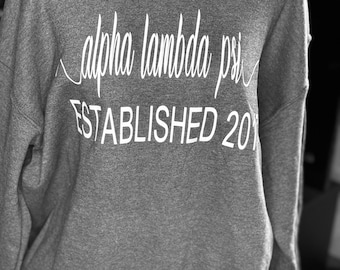Alpha Lambda Psi - Sudadera con cuello redondo establecida en 2017