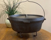 WENZEL 1887 Cast Iron Dutch Oven Roaster (Camping) With Lid. Trivet And Carry Bag Included.