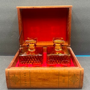 Vintage Wooden Hunting Book Hidden Whiskey Decanter Set.   2 Amber Glass Decanters &  (4) Amber Glass Shot Glasses.