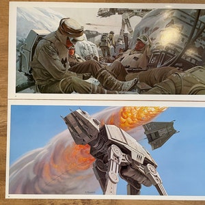 May include: Two framed prints featuring science fiction art. The top print depicts soldiers in white uniforms resting in a snowy environment. The bottom print shows a large, mechanical walker firing at a flying vehicle against a blue sky.