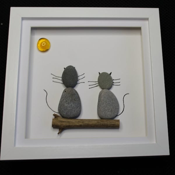 Handmade Pebble art Two cats sitting on Log picture