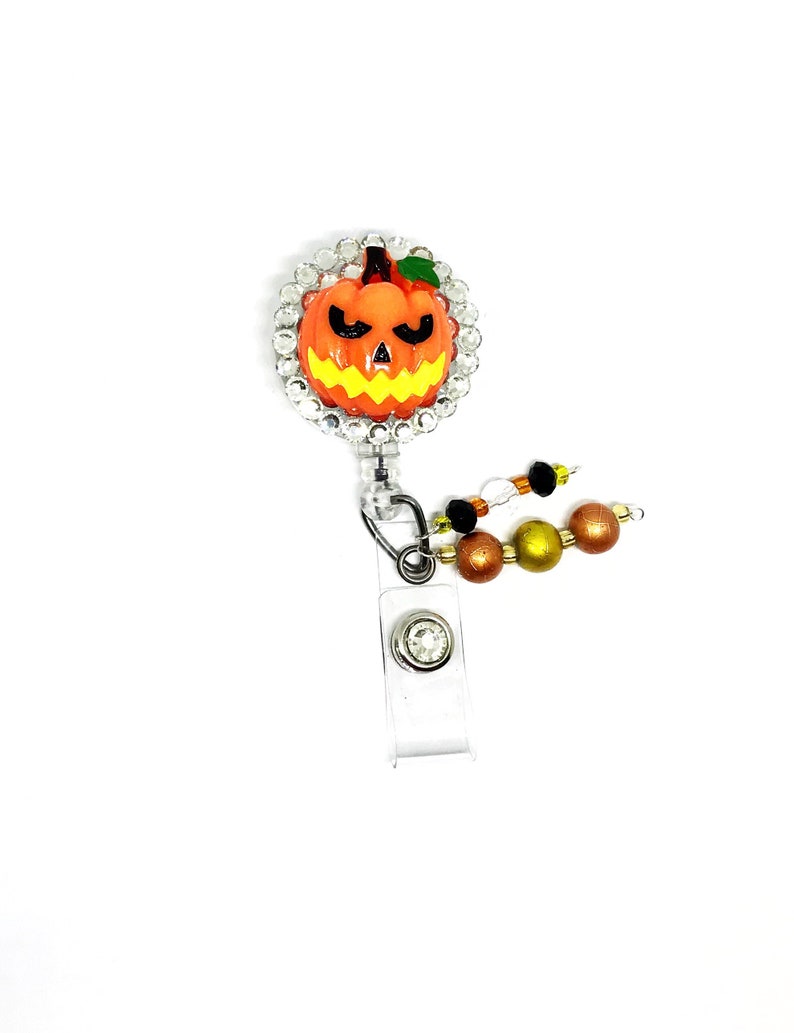 Pumpkin badge reel. Name badge holder Retractable nurse ID badge clip Halloween badge reel