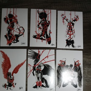 May include: Six black and white illustrations of figures tied up with red rope. The figures are in various poses, some are hanging upside down, some are kneeling, and some are standing. The illustrations are on white card stock.