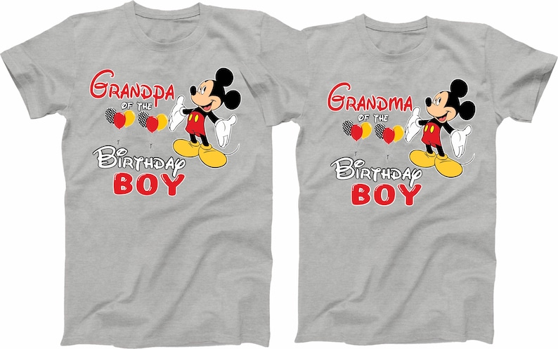 May include: Two grey t-shirts with a cartoon image of Mickey Mouse. The text on the shirts reads "Grandpa of the Birthday Boy" and "Grandma of the Birthday Boy".
