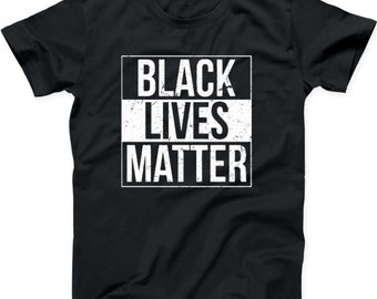 May include: Black t-shirt with a white graphic that says "Black Lives Matter" in a distressed font.